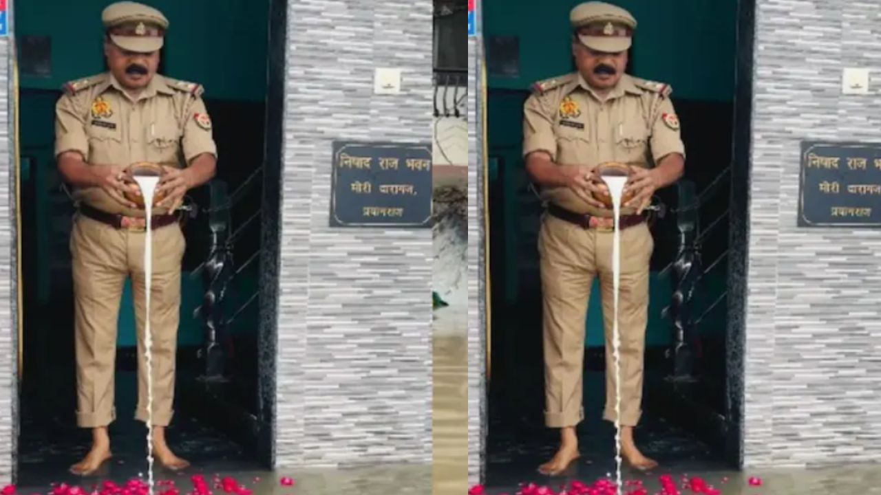 UP Cop’s Heartfelt Worship of Floodwater in Prayagraj Wins the Internet
